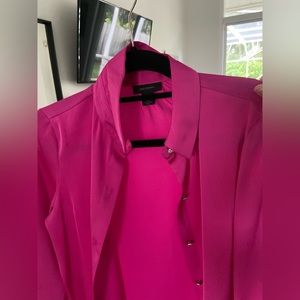 Fushia blouse with embellished buttons. Beautiful color